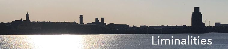 Liminalities name over photo of Birkenhead at sunset, taken from the Waterfront at Queen's Dock